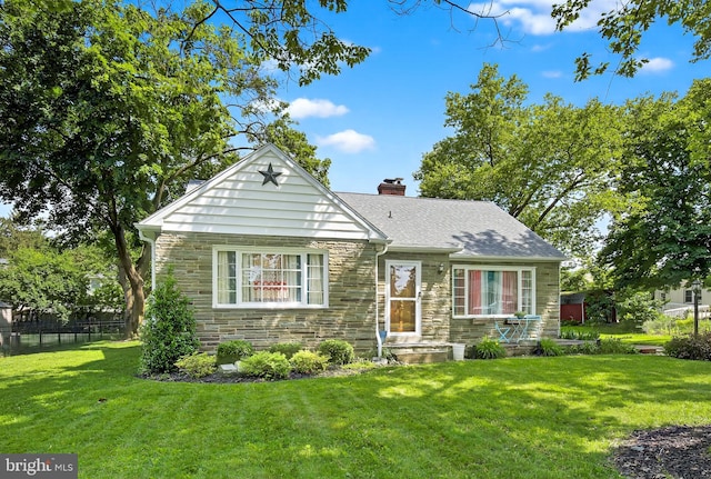 15 Overlook Ave, Lancaster, PA 17601 - view of front of home featuring stone siding, a chimney, and roof with shingles