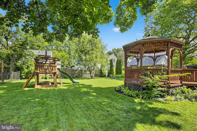 15 Overlook Ave, Lancaster, PA 17601 - fenced backyard featuring a gazebo, a playground, and a wooden deck