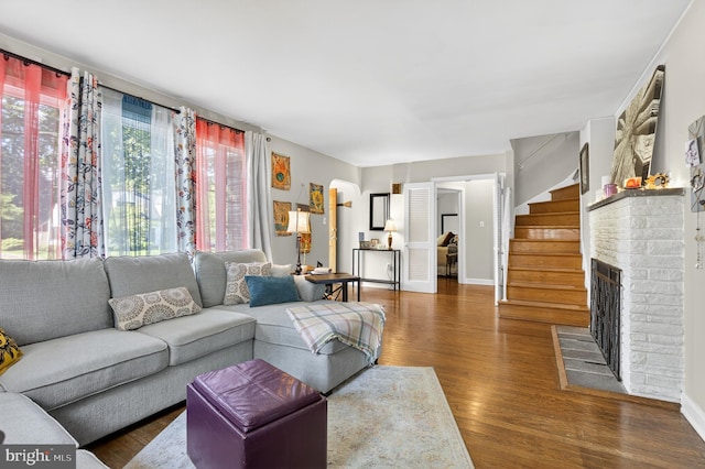 15 Overlook Ave, Lancaster, PA 17601 - living area featuring wood finished floors, stairs, and a brick fireplace