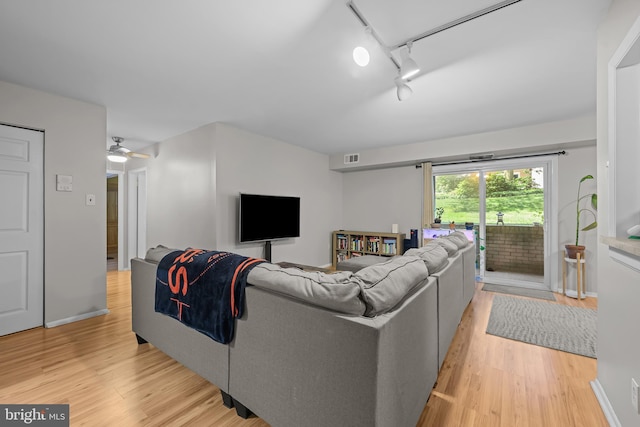7 Rockford Rd Unit F1, Wilmington, DE 19806 - living room featuring light wood-style floors, track lighting, and ceiling fan
