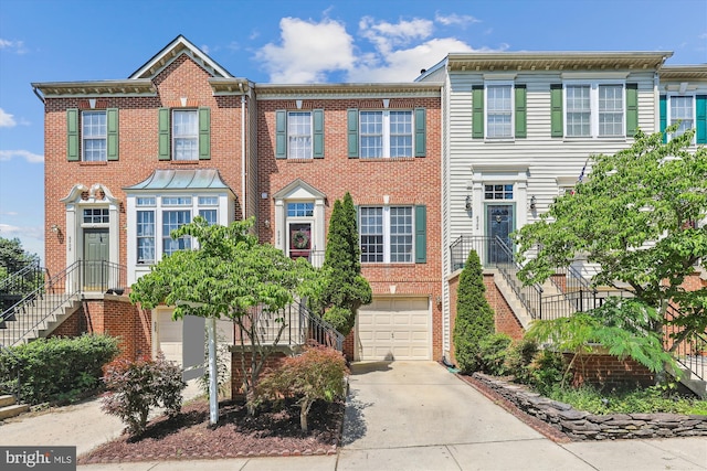 6706 Debra Lu Way, Springfield, VA 22150 - multi unit property with a garage, driveway, brick siding, and stairway