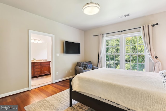 6706 Debra Lu Way, Springfield, VA 22150 - bedroom featuring wood finished floors and connected bathroom