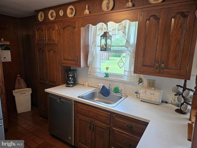 1220 Manatawny St, Pottstown, PA 19464 - kitchen with dishwasher, light countertops, and brown cabinets