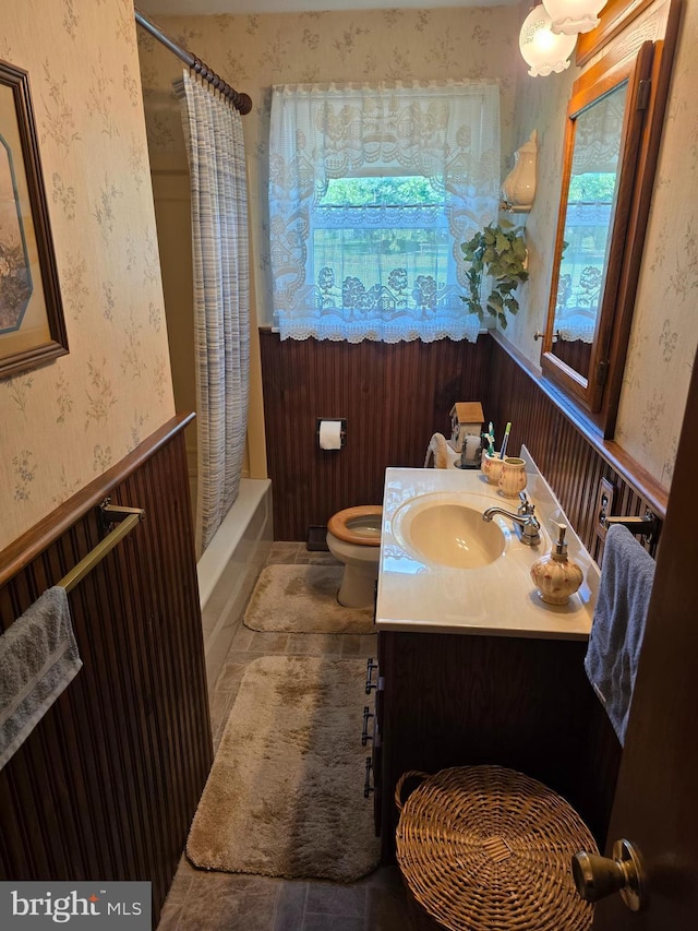 1220 Manatawny St, Pottstown, PA 19464 - full bath featuring wallpapered walls, healthy amount of natural light, vanity, shower / bath combination with curtain, and wainscoting