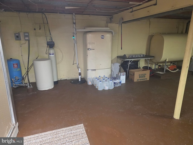 1220 Manatawny St, Pottstown, PA 19464 - basement featuring a water pressure tank, a water softener, and concrete block wall