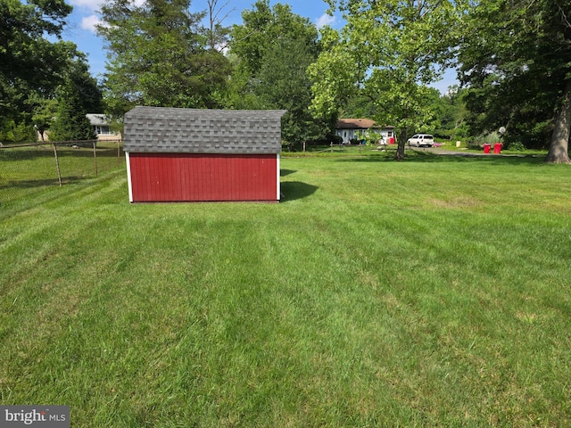 1220 Manatawny St, Pottstown, PA 19464 - view of yard featuring a shed and view of wooded area