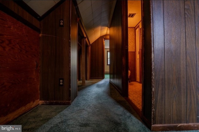 102 Spring St, Bridgeton, NJ 08302 - corridor featuring carpet flooring, wood walls, and lofted ceiling