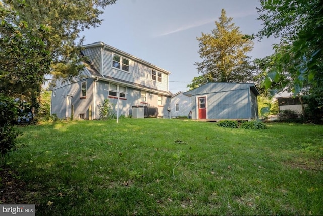 102 Spring St, Bridgeton, NJ 08302 - back of house with a yard and an outbuilding