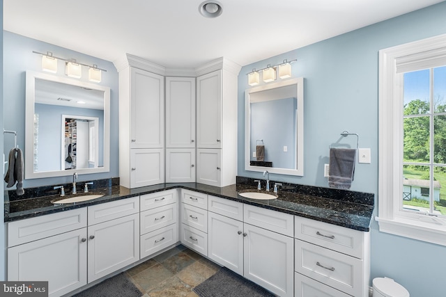 1263 Argyle Rd, Berwyn, PA 19312 - full bath with double vanity and stone finish floors