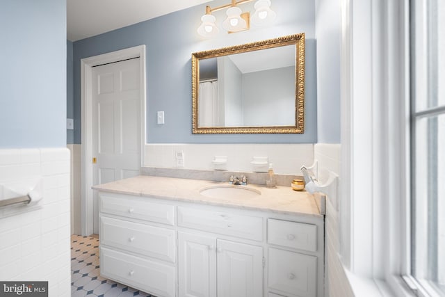 1263 Argyle Rd, Berwyn, PA 19312 - bathroom with tile walls, vanity, and wainscoting