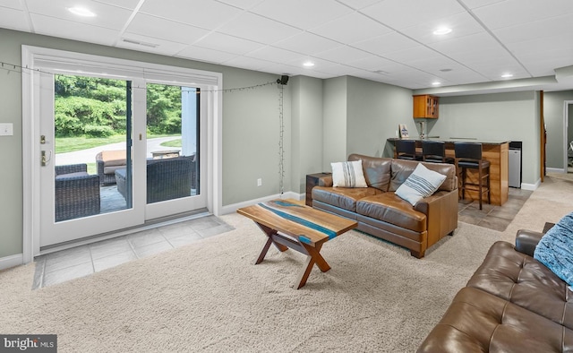 1263 Argyle Rd, Berwyn, PA 19312 - living area featuring a drop ceiling, recessed lighting, light colored carpet, and light tile patterned flooring