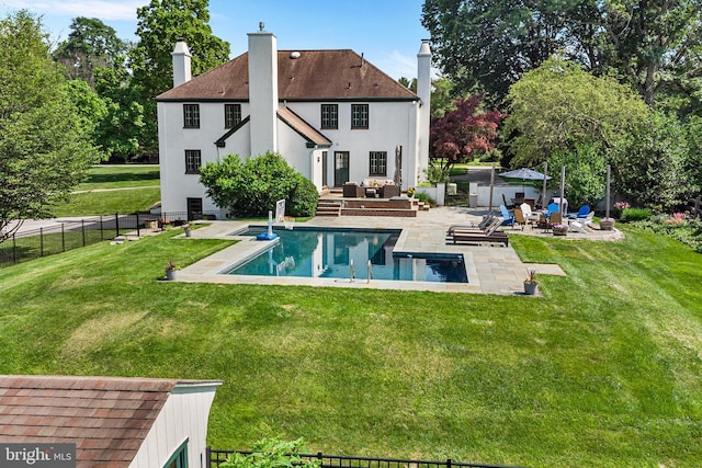 1263 Argyle Rd, Berwyn, PA 19312 - rear view of house with outdoor lounge area, a patio, stucco siding, a chimney, and roof with shingles