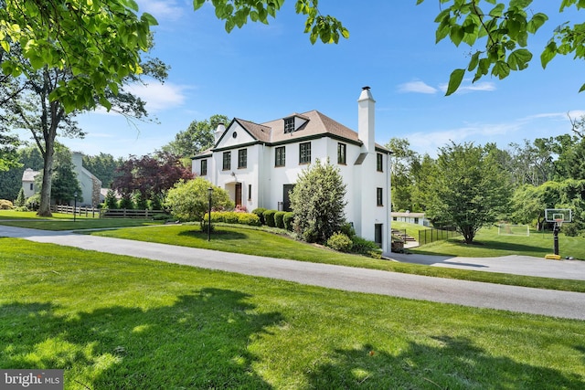 1263 Argyle Rd, Berwyn, PA 19312 - view of front of house with a chimney and stucco siding