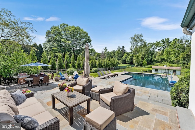 1263 Argyle Rd, Berwyn, PA 19312 - swimming pool with an outdoor living space, a patio, and outdoor dining space