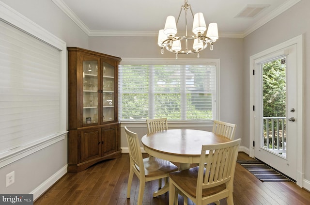 6838 Saint Albans Rd, Mclean, VA 22101 - dining space featuring a chandelier, dark wood-style flooring, and crown molding