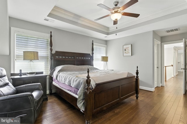 6838 Saint Albans Rd, Mclean, VA 22101 - bedroom featuring a raised ceiling, crown molding, dark wood-type flooring, and a ceiling fan