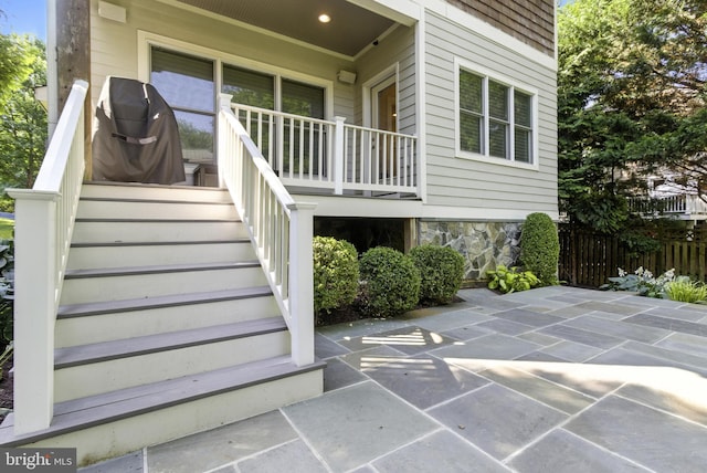 6838 Saint Albans Rd, Mclean, VA 22101 - doorway to property with stone siding and a porch
