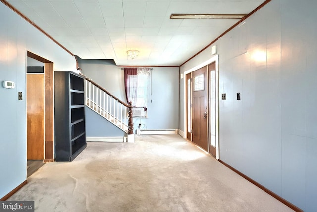 545 W King St, Littlestown, PA 17340 - carpeted entrance foyer featuring a baseboard radiator, stairs, cooling unit, and crown molding