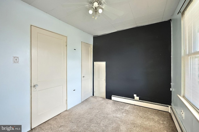 545 W King St, Littlestown, PA 17340 - unfurnished bedroom with baseboard heating and carpet