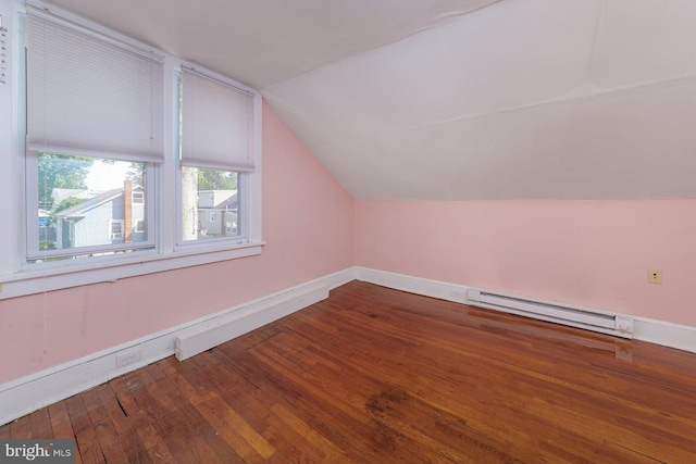 124 E Ormond Ave, Haddon Township, NJ 08107 - additional living space with baseboard heating, vaulted ceiling, and hardwood / wood-style flooring