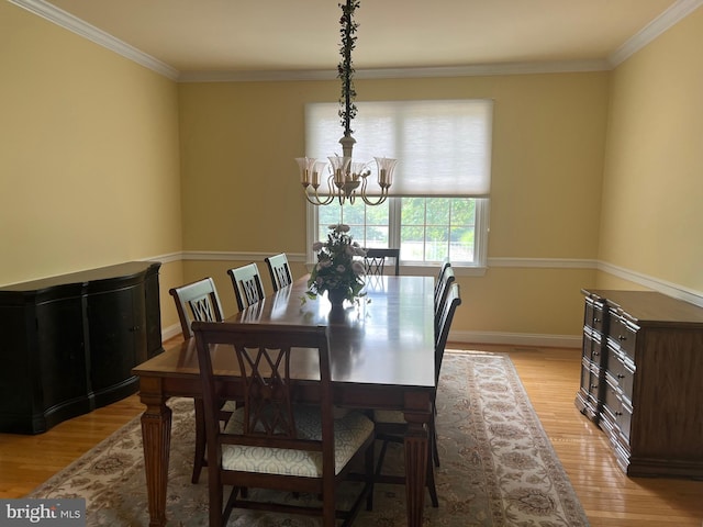 7 Camas Ct, Plainsboro, NJ 08536 - dining area featuring a chandelier, light wood finished floors, and ornamental molding
