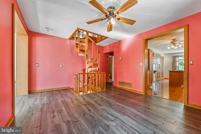 8283 Choptank Rd, Pasadena, MD 21122 - spare room with a ceiling fan and wood finished floors