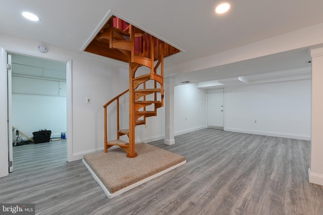 8283 Choptank Rd, Pasadena, MD 21122 - finished below grade area with stairs, wood finished floors, and recessed lighting