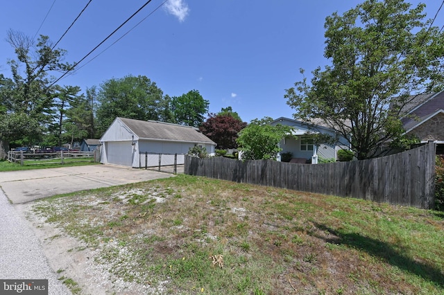8283 Choptank Rd, Pasadena, MD 21122 - view of yard with an outbuilding and a garage
