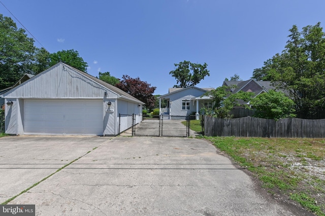 8283 Choptank Rd, Pasadena, MD 21122 - view of front of house featuring a garage and a gate