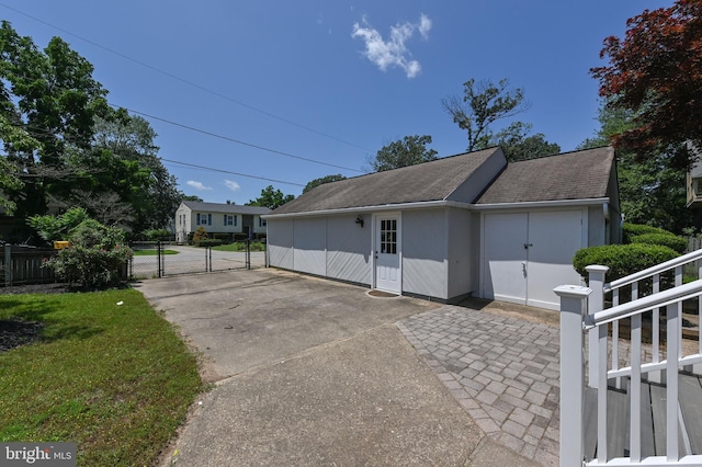8283 Choptank Rd, Pasadena, MD 21122 - view of property exterior featuring a gate and a shingled roof
