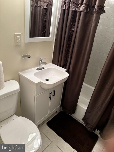 5755 E Capitol St SE, Washington, DC 20019 - full bathroom with vanity, shower / bath combo, and tile patterned flooring
