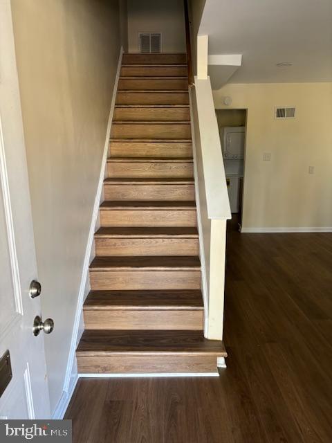 5755 E Capitol St SE, Washington, DC 20019 - stairway featuring wood finished floors