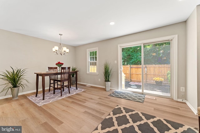 8573 Chester Grove Ct, Springfield, VA 22153 - dining space with wood finished floors, a chandelier, and recessed lighting