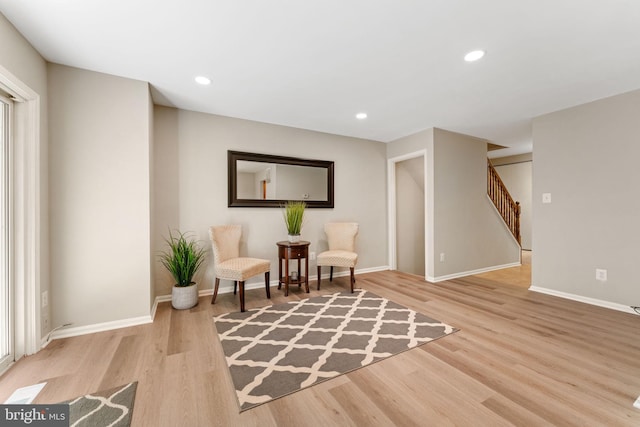 8573 Chester Grove Ct, Springfield, VA 22153 - sitting room with wood finished floors, stairway, and recessed lighting