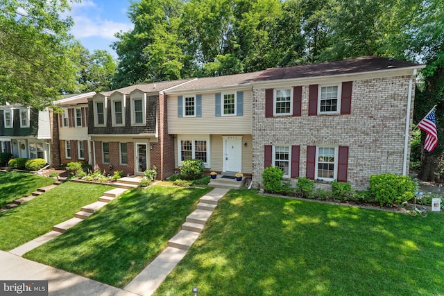8573 Chester Grove Ct, Springfield, VA 22153 - view of front of home with brick siding and a front yard