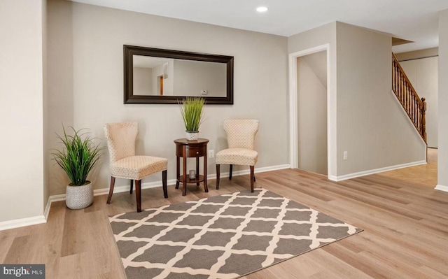 8573 Chester Grove Ct, Springfield, VA 22153 - living area featuring wood finished floors, stairs, and recessed lighting