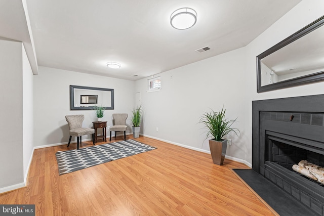 8573 Chester Grove Ct, Springfield, VA 22153 - living area with a fireplace with flush hearth and wood finished floors