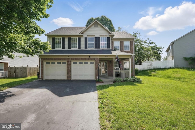13297 Osage Dr, Woodbridge, VA 22193 - multi unit property featuring a garage, asphalt driveway, covered porch, and brick siding