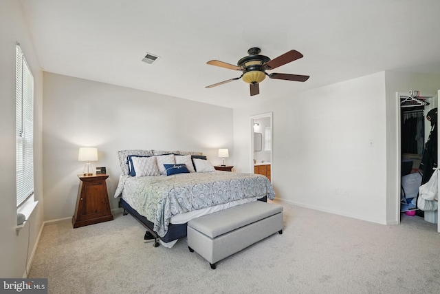 13297 Osage Dr, Woodbridge, VA 22193 - bedroom featuring carpet flooring, a spacious closet, ceiling fan, connected bathroom, and a closet