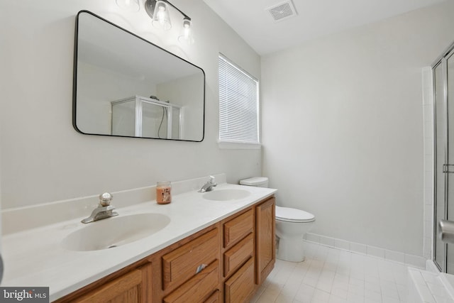 13297 Osage Dr, Woodbridge, VA 22193 - bathroom with a shower with door, double vanity, and tile patterned flooring