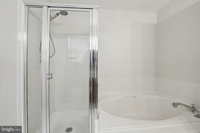 13297 Osage Dr, Woodbridge, VA 22193 - full bathroom with a stall shower and a garden tub