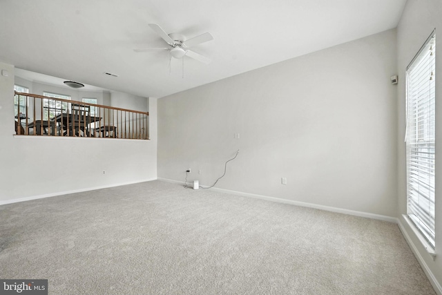13297 Osage Dr, Woodbridge, VA 22193 - empty room featuring a ceiling fan, carpet flooring, and healthy amount of natural light