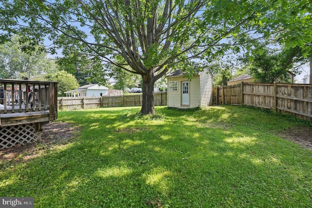 13297 Osage Dr, Woodbridge, VA 22193 - fenced backyard with a wooden deck and a shed