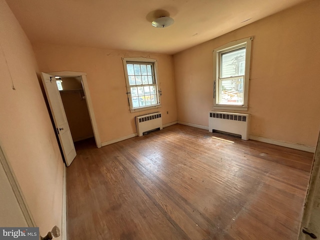 1903 Tinsman Ave, Pennsauken, NJ 08110 - unfurnished room with radiator heating unit and wood finished floors