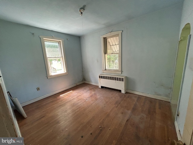 1903 Tinsman Ave, Pennsauken, NJ 08110 - unfurnished bedroom featuring radiator and wood finished floors
