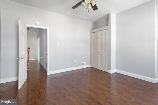 2528 E Somerset St, Philadelphia, PA 19134 - unfurnished bedroom featuring dark wood-type flooring, a closet, and ceiling fan