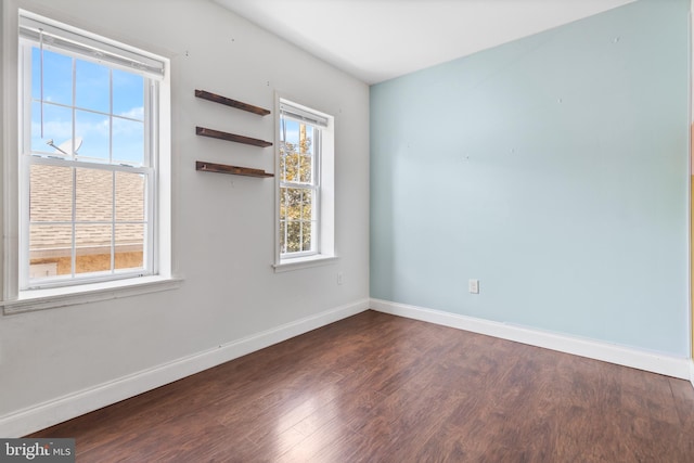 2528 E Somerset St, Philadelphia, PA 19134 - unfurnished room with dark wood-style flooring and baseboards