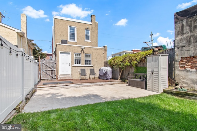 2528 E Somerset St, Philadelphia, PA 19134 - back of property with a fenced backyard, a patio area, a gate, and stucco siding