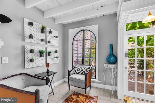 1243 Battery Ave, Baltimore, MD 21230 - living area featuring light tile patterned floors and a wooden ceiling with exposed beams