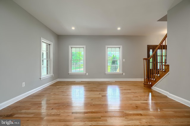 10905 Powers Ave, Cockeysville, MD 21030 - spare room with stairway, light wood-type flooring, and recessed lighting